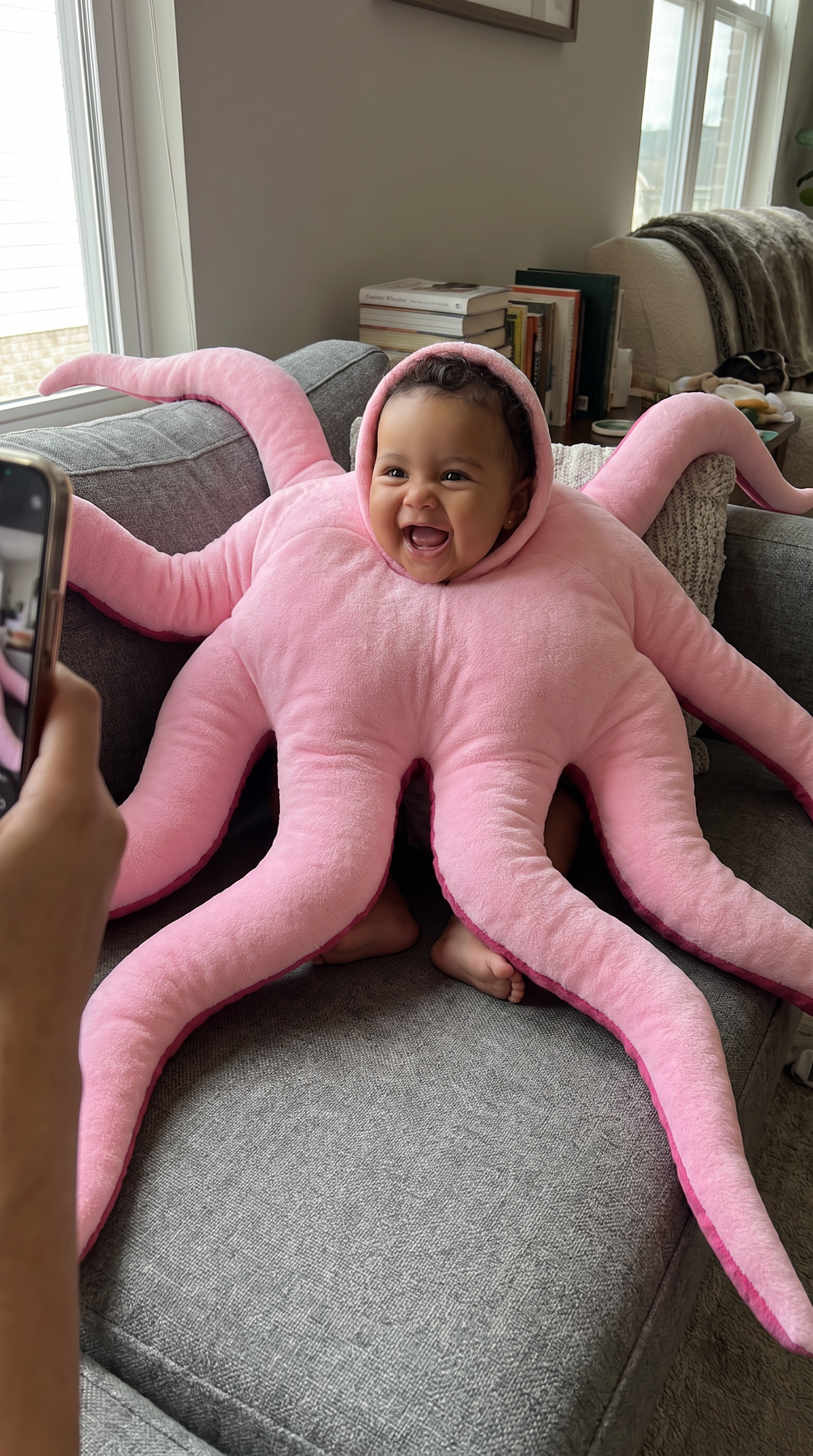 Baby wearing Snuggletopus plush octopus costume 7